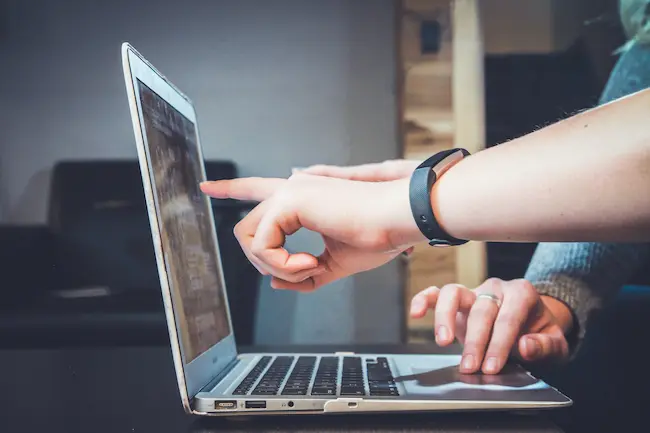 two people using a computer